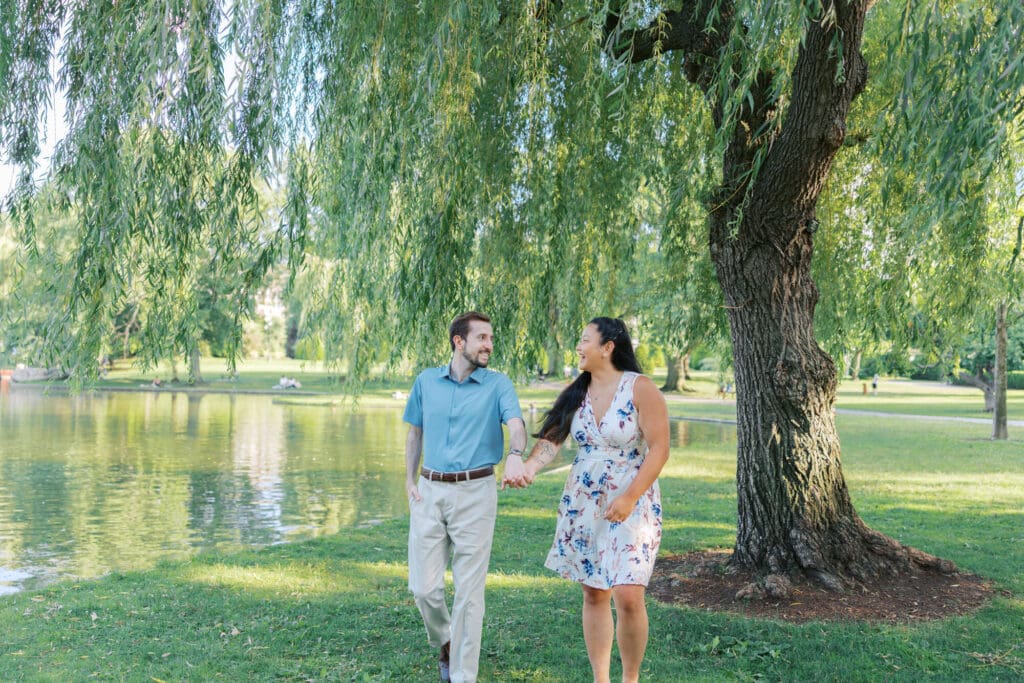 Engagement photography in Boston featuring a couple sharing a natural moment.